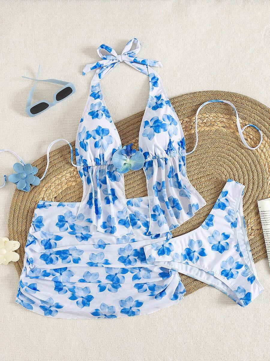 Women's 3-piece floral bikini set featuring a multicolor plant print halter top with 3D rose detail, matching bikini bottoms, and short skirt cover-up