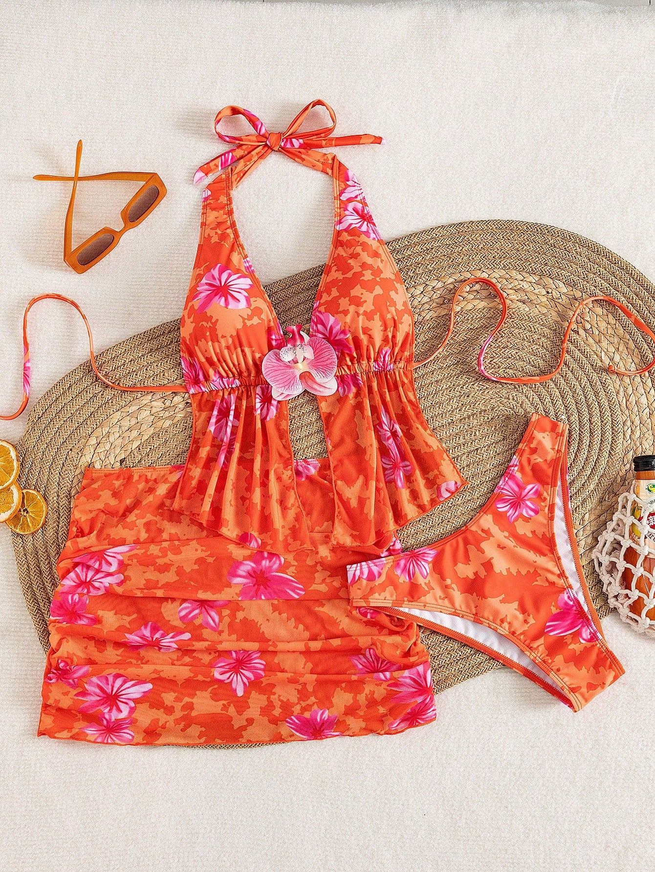 Women's 3-piece floral bikini set featuring a multicolor plant print halter top with 3D rose detail, matching bikini bottoms, and short skirt cover-up