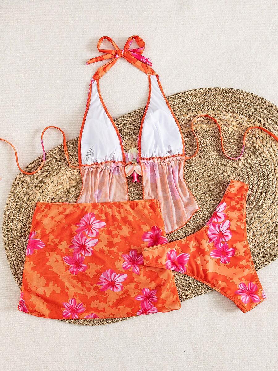 Women's 3-piece floral bikini set featuring a multicolor plant print halter top with 3D rose detail, matching bikini bottoms, and short skirt cover-up