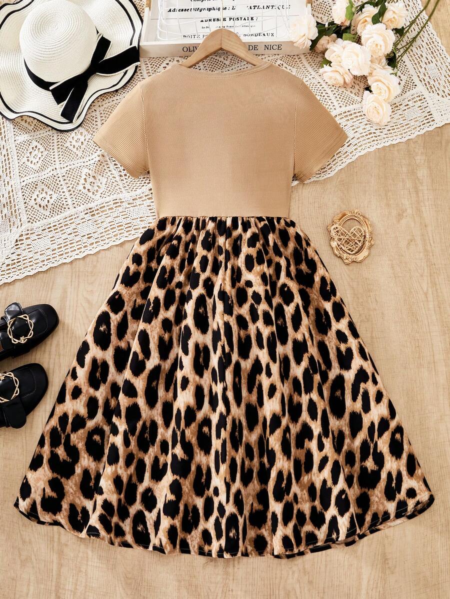 Tween girls casual short sleeve mini dress featuring a round neck, high waist, and flared A-line silhouette.