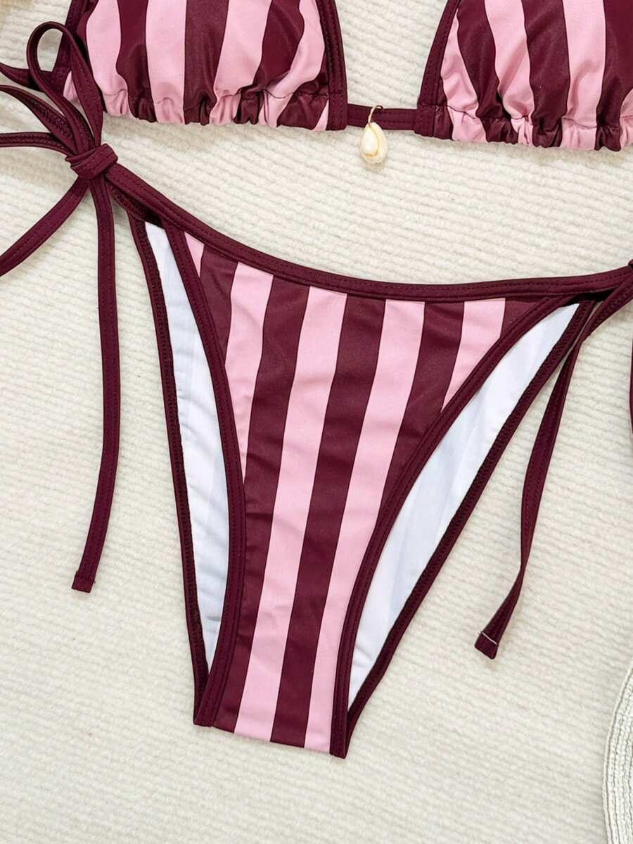 Women's apricot solid halter tie bikini top with triangle cups and matching tie-side swimsuit bottoms.