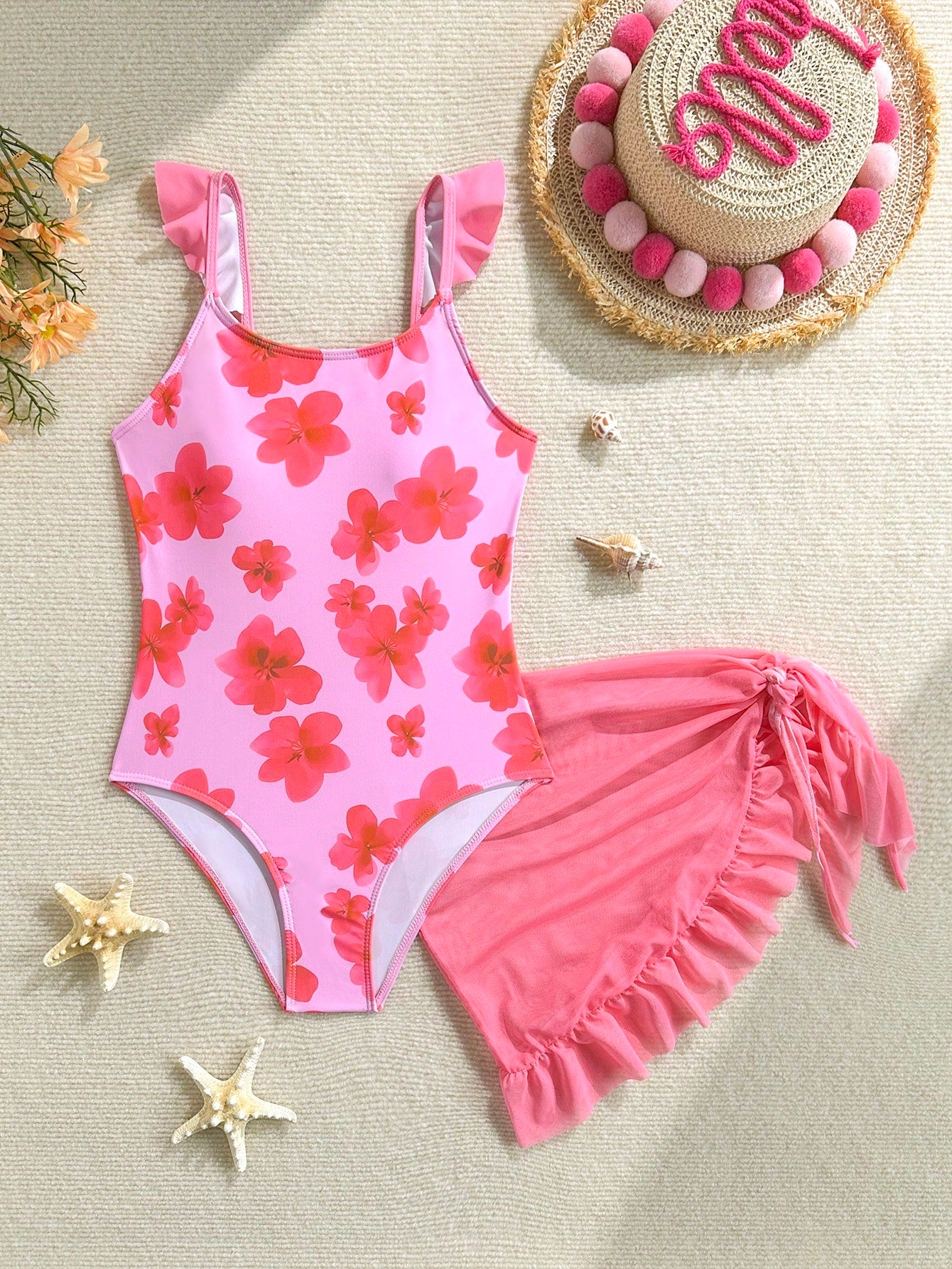 Tween girls one-piece swimsuit in leopard print with ruffle shoulder straps, scoop neckline, fitted shape, and attached ruffle hem skirt; sleeveless, mid-waist skirt bottom, and lined body for swimming, vacation, and summer beach wear.