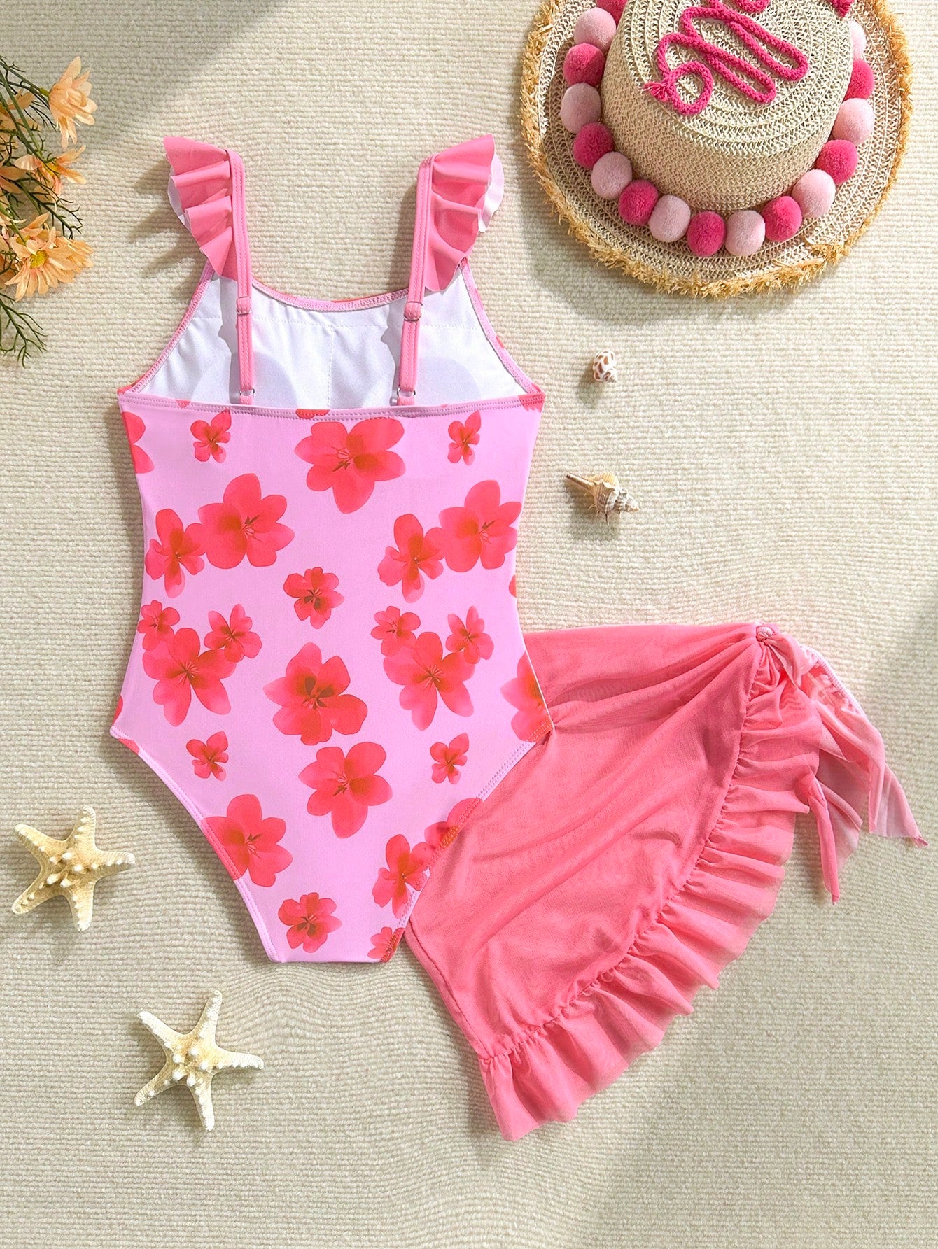 Tween girls one-piece swimsuit in leopard print with ruffle shoulder straps, scoop neckline, fitted shape, and attached ruffle hem skirt; sleeveless, mid-waist skirt bottom, and lined body for swimming, vacation, and summer beach wear.