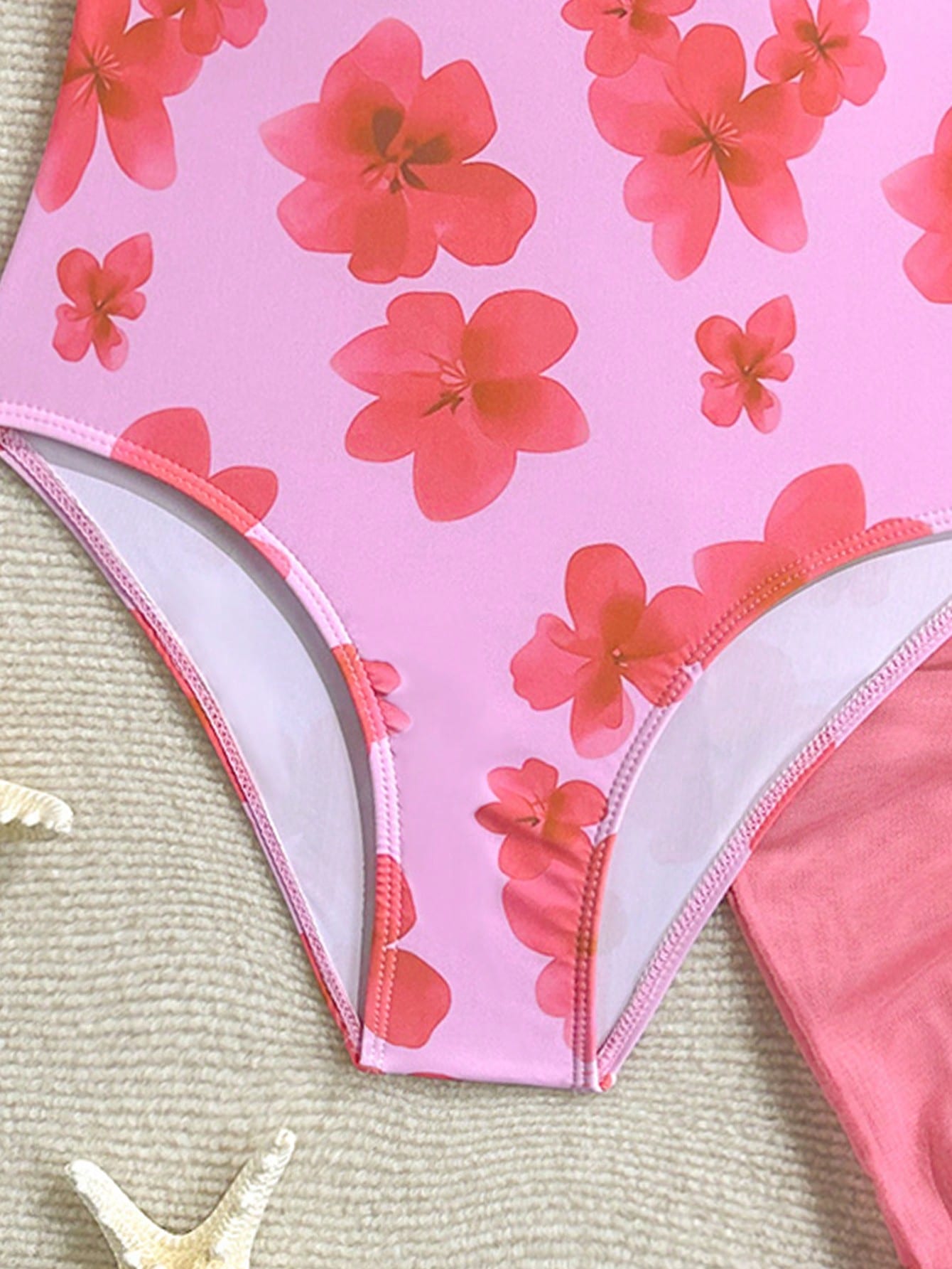 Tween girls one-piece swimsuit in leopard print with ruffle shoulder straps, scoop neckline, fitted shape, and attached ruffle hem skirt; sleeveless, mid-waist skirt bottom, and lined body for swimming, vacation, and summer beach wear.