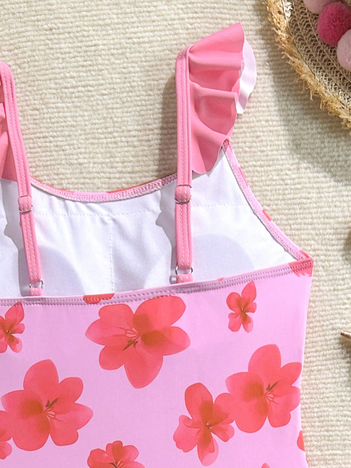 Tween girls one-piece swimsuit in leopard print with ruffle shoulder straps, scoop neckline, fitted shape, and attached ruffle hem skirt; sleeveless, mid-waist skirt bottom, and lined body for swimming, vacation, and summer beach wear.