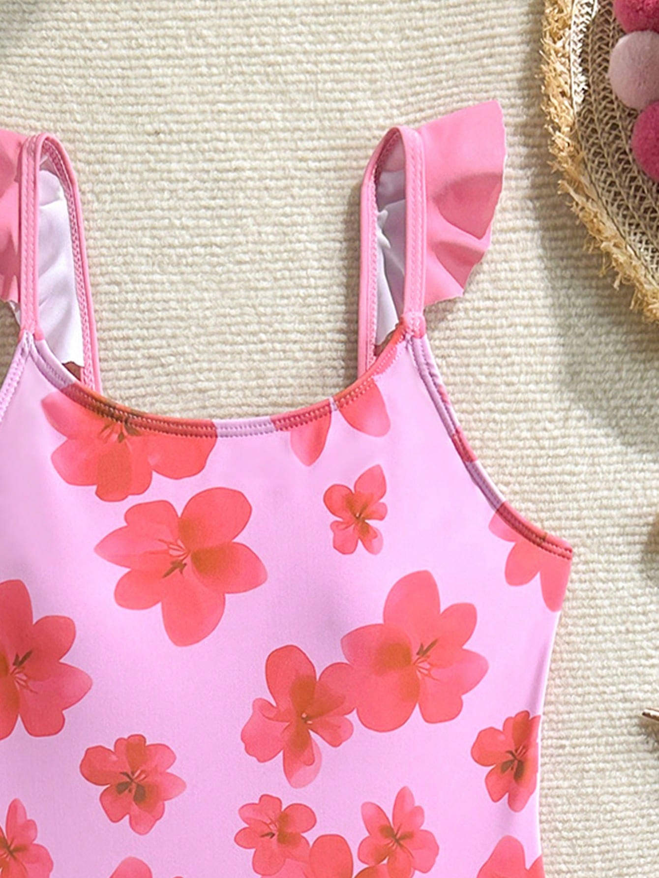 Tween girls one-piece swimsuit in leopard print with ruffle shoulder straps, scoop neckline, fitted shape, and attached ruffle hem skirt; sleeveless, mid-waist skirt bottom, and lined body for swimming, vacation, and summer beach wear.