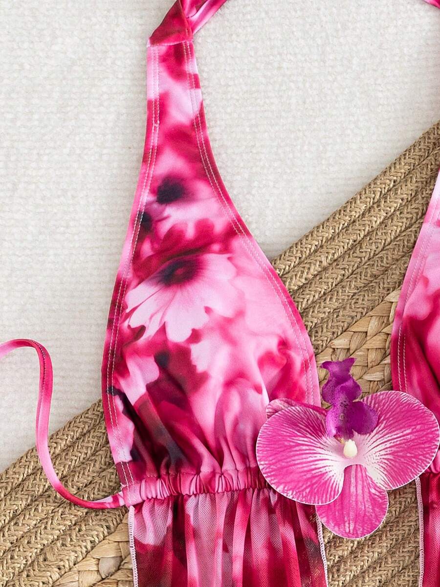 Women's 3-piece floral bikini set featuring a multicolor plant print halter top with 3D rose detail, matching bikini bottoms, and short skirt cover-up