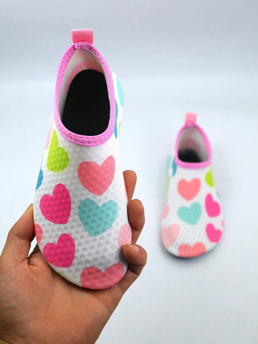 Multicolor kids slip-on water shoes with breathable Lycra upper and non-slip TPR outsole for boys and girls.