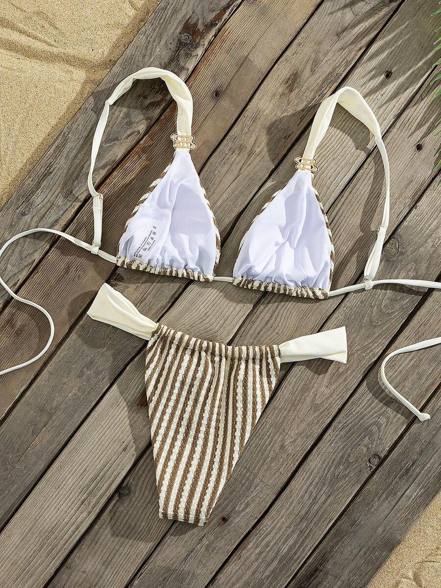 Multicolor colorblock bikini set for women featuring a wireless triangle bra top with shoulder straps and ring knot details paired with high waist high cut bottoms.