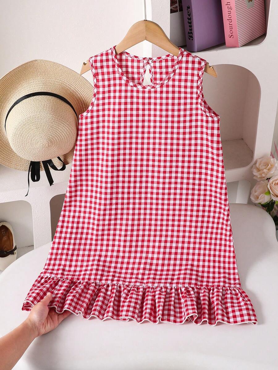 Tween girls casual leopard print smock mini dress featuring a round neck and flounce ruffle hem.