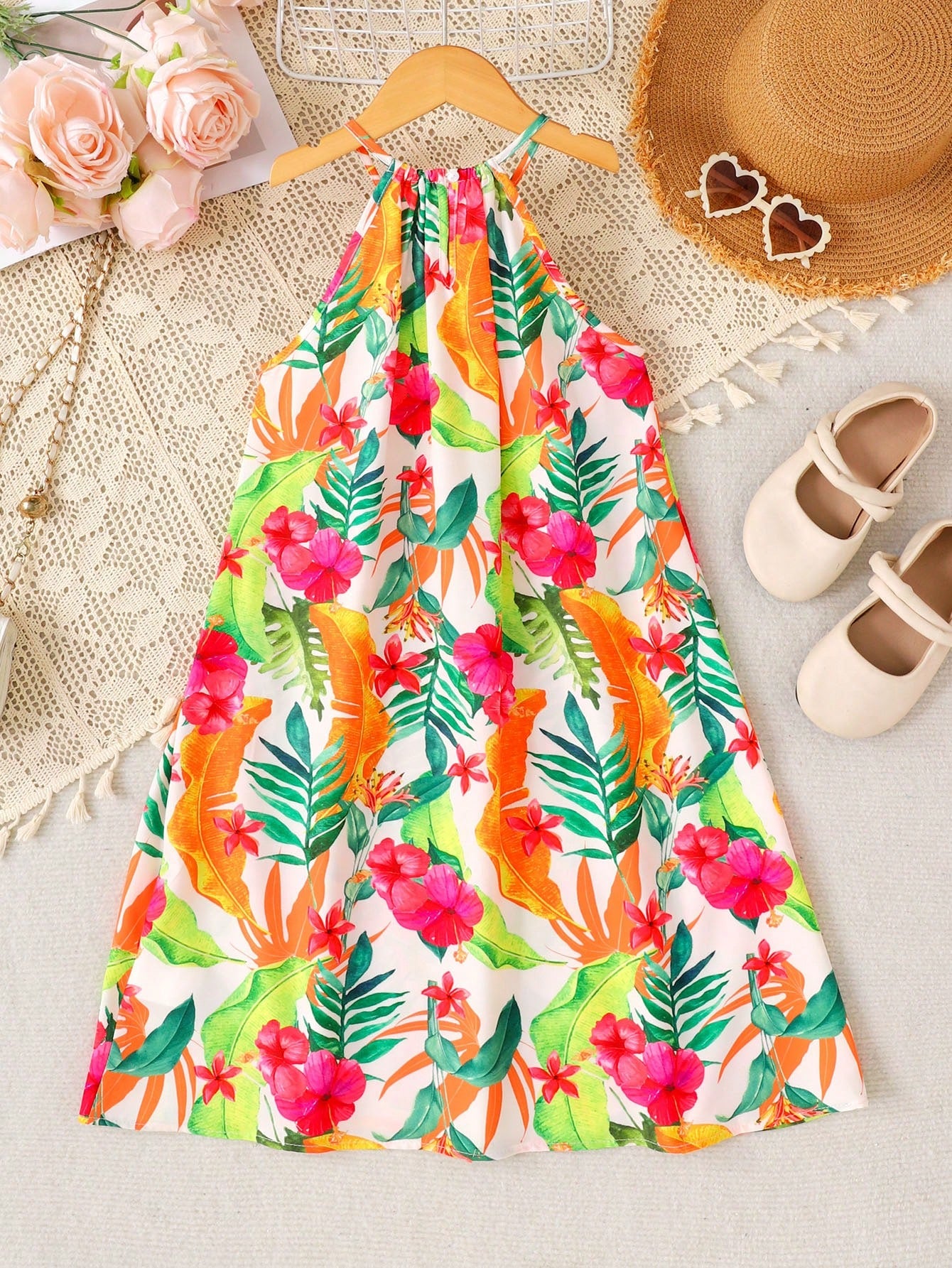 Tween girls sleeveless halter A-line dress with multicolor tropical fruit and vegetable all-over print, high waist, flounce hem, and zipper detail for summer vacation wear