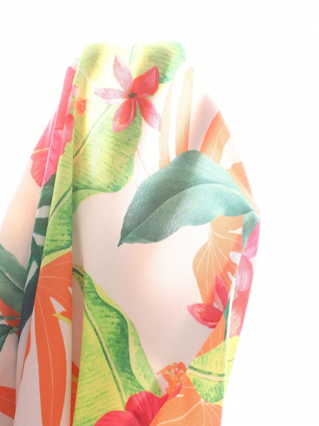 Tween girls sleeveless halter A-line dress with multicolor tropical fruit and vegetable all-over print, high waist, flounce hem, and zipper detail for summer vacation wear