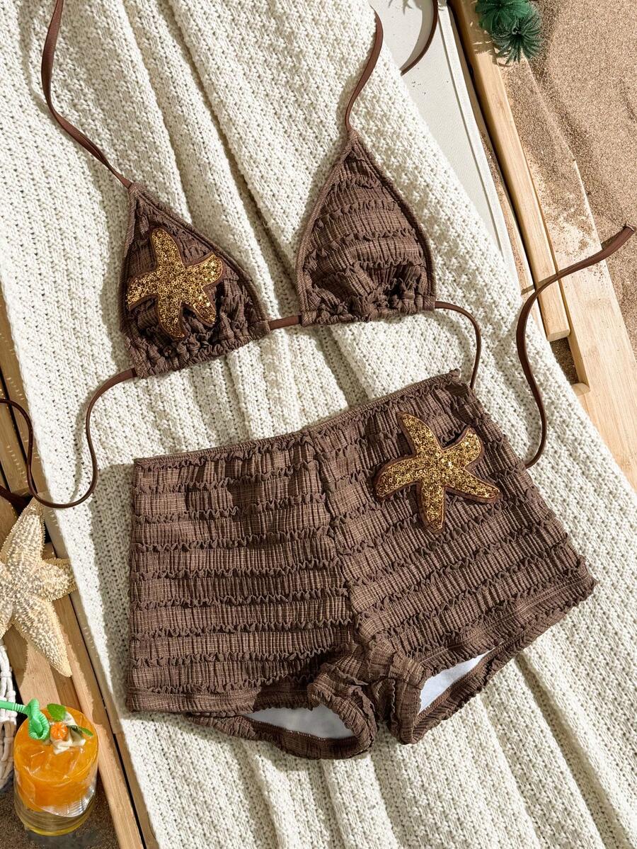 Women's apricot two-piece swimsuit set with a halter tie-back top and matching high stretch shorts.