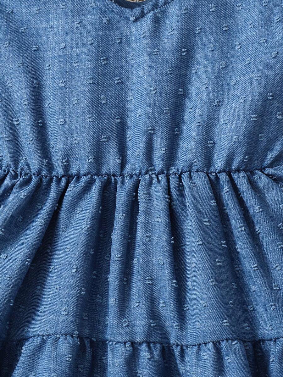 Girls sleeveless blue tiered dress featuring a V-neckline, high waist, and A-line skirt.