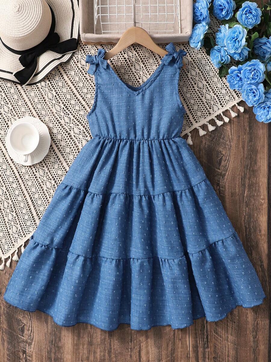 Girls sleeveless blue tiered dress featuring a V-neckline, high waist, and A-line skirt.