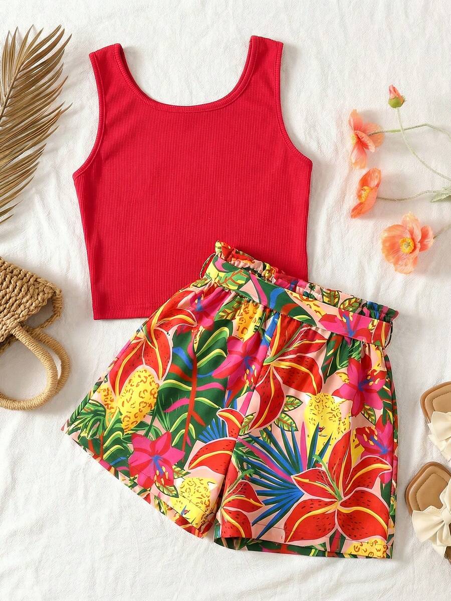 Tween girl wearing a casual 2-piece set featuring a black rib-knit scoop neck tank top and leopard print paperbag waist shorts with a matching belt.