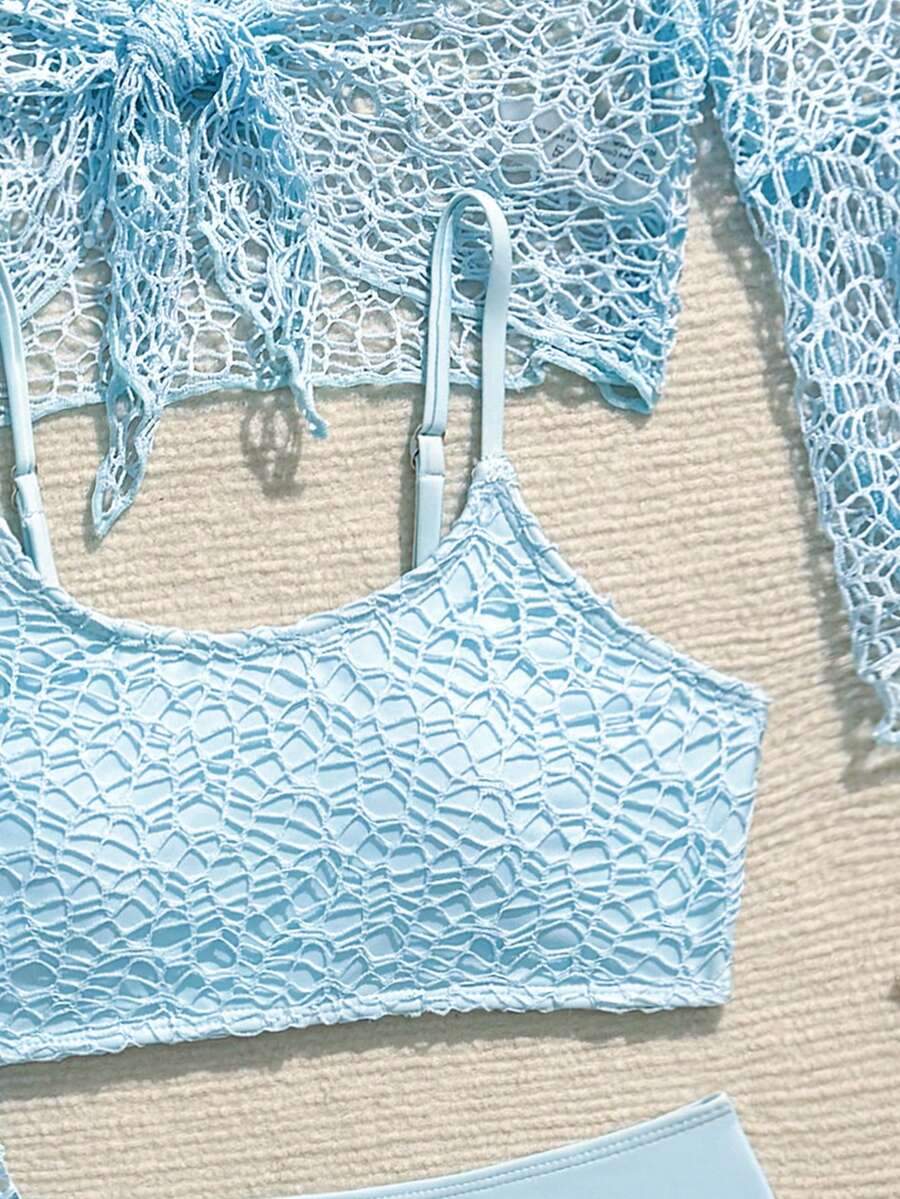 Tween girls beige bikini set with long sleeve round neck top, hollow-out asymmetrical details, mid-waist bottoms, and cover up for beach or vacation swimwear