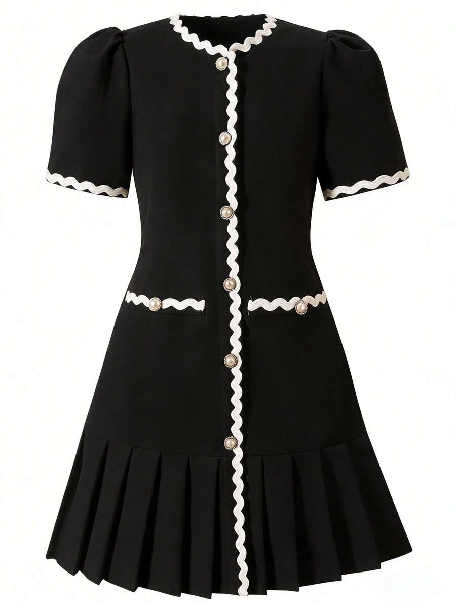 Tween girls apricot short-sleeve pleated smock dress with 3D bow decor and round neckline.