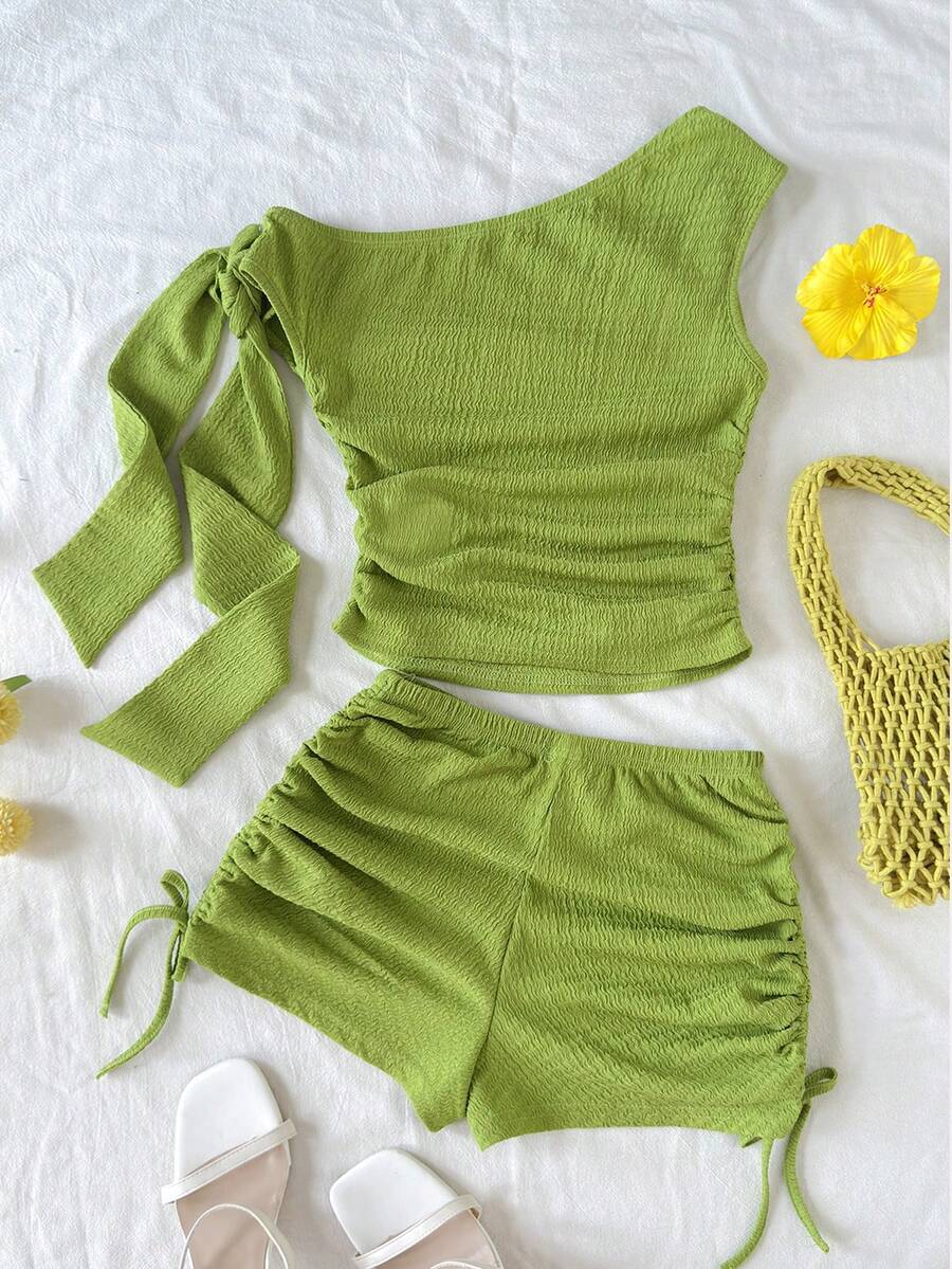 Tween girls army green striped rib-knit two-piece set with asymmetrical neck crop top and matching slim fit shorts.