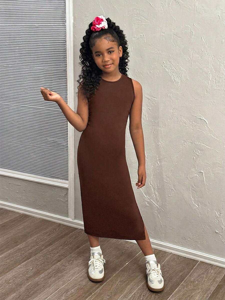 Tween girls sleeveless midi tank dress with round neck, graphic pattern, slim fit waist, slit hem, and apricot color styling for casual and occasion wear.