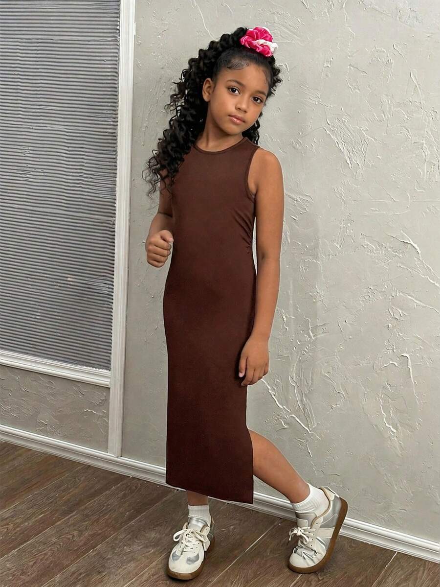 Tween girls sleeveless midi tank dress with round neck, graphic pattern, slim fit waist, slit hem, and apricot color styling for casual and occasion wear.
