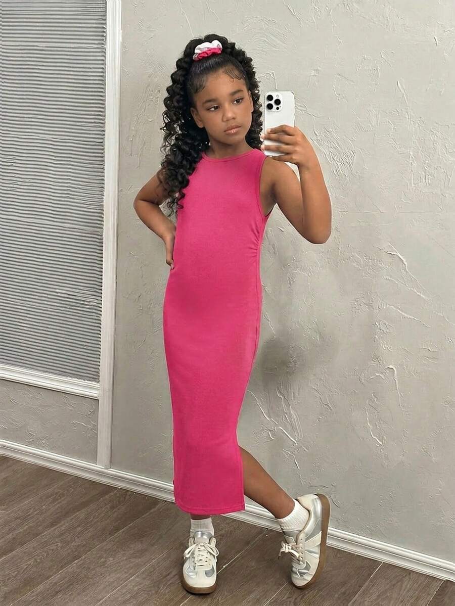 Tween girls sleeveless midi tank dress with round neck, graphic pattern, slim fit waist, slit hem, and apricot color styling for casual and occasion wear.