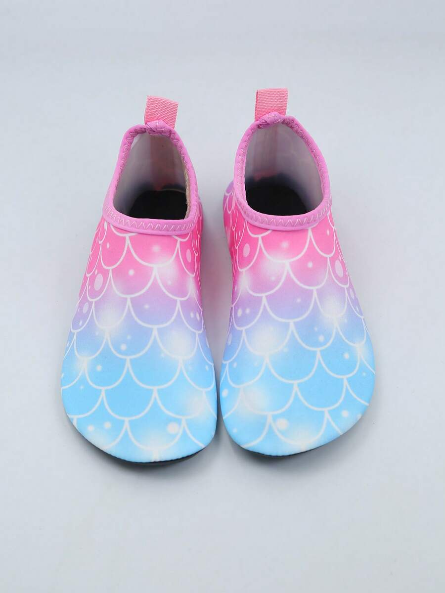 Multicolor kids slip-on water shoes with breathable Lycra upper and non-slip TPR outsole for boys and girls.