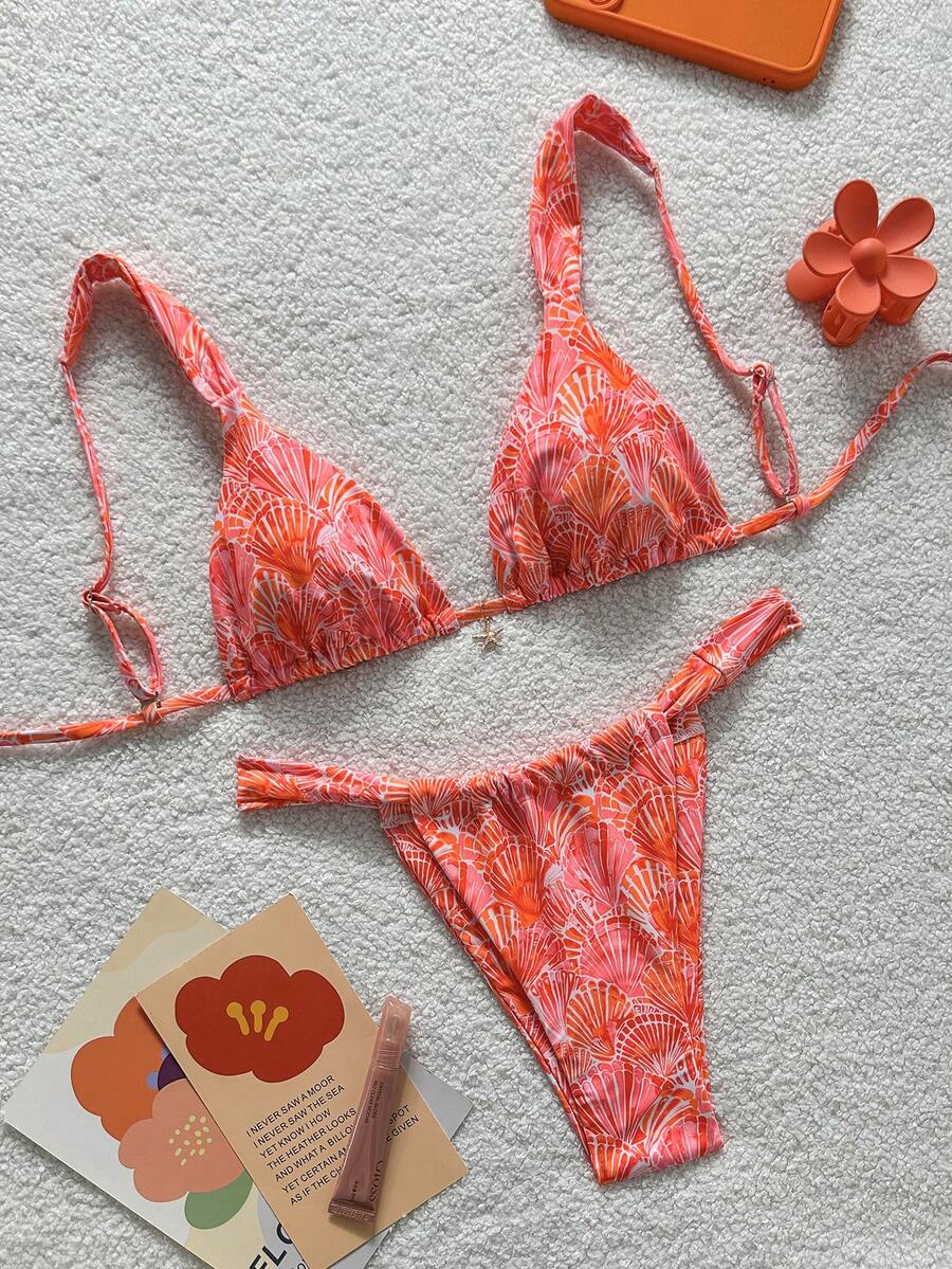 Women's 2-piece triangle cup bikini set in solid color featuring woven pearl shell decoration, halter neckline, and high-waist side-tie ruched bottoms.