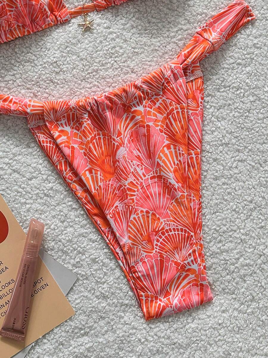 Women's 2-piece triangle cup bikini set in solid color featuring woven pearl shell decoration, halter neckline, and high-waist side-tie ruched bottoms.