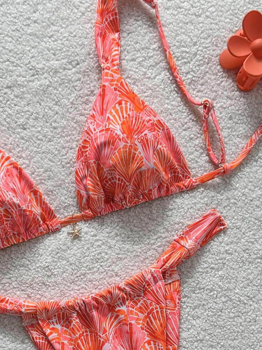 Women's 2-piece triangle cup bikini set in solid color featuring woven pearl shell decoration, halter neckline, and high-waist side-tie ruched bottoms.