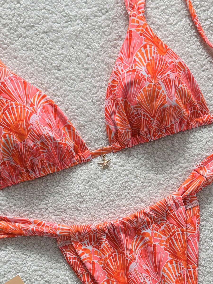 Women's 2-piece triangle cup bikini set in solid color featuring woven pearl shell decoration, halter neckline, and high-waist side-tie ruched bottoms.