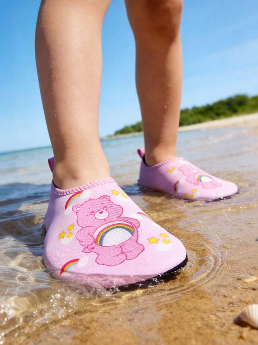 Girls cartoon pattern non-slip water shoes with slip-on closure and durable TPR outsole for beach and outdoor sports.
