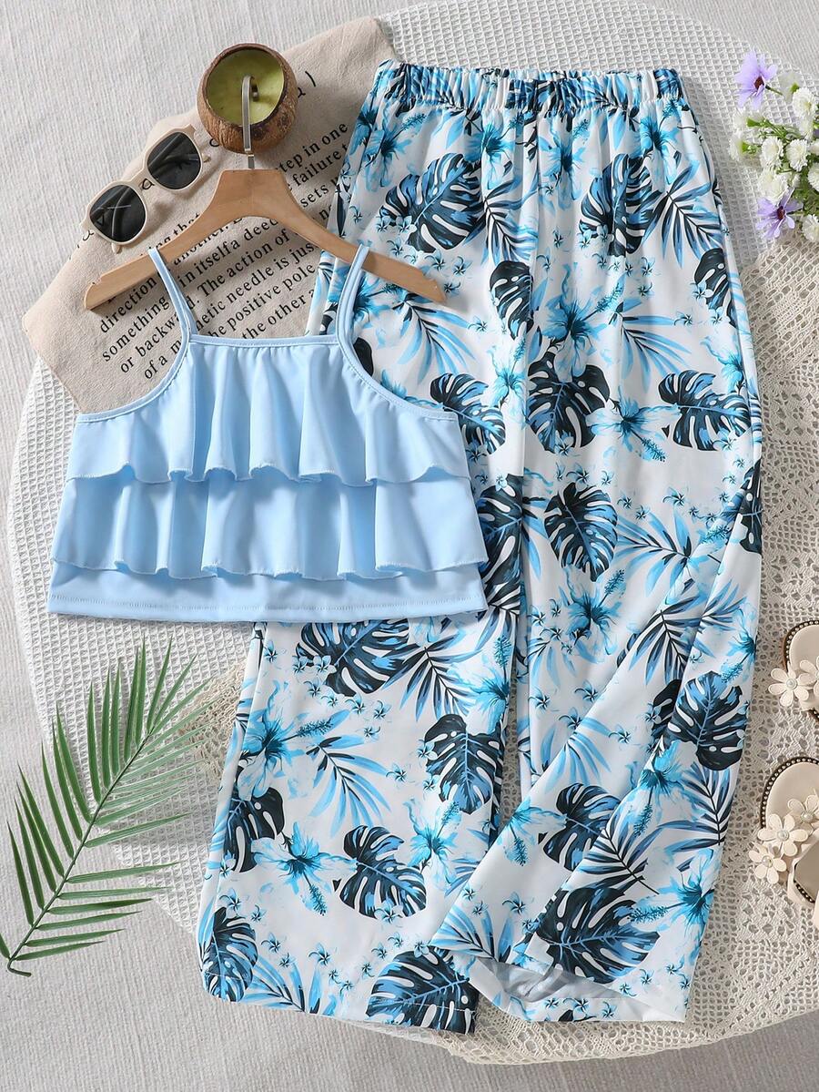 Tween girls blue 2-piece vacation outfit set featuring a tiered ruffle spaghetti strap camisole and loose high-waist pants.