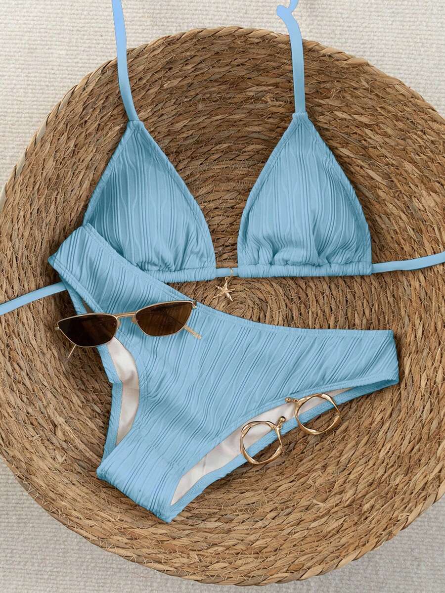 Women's apricot 2-piece halter bikini set featuring a wireless triangle top with tie-back detail and high-waisted high-cut bottoms.