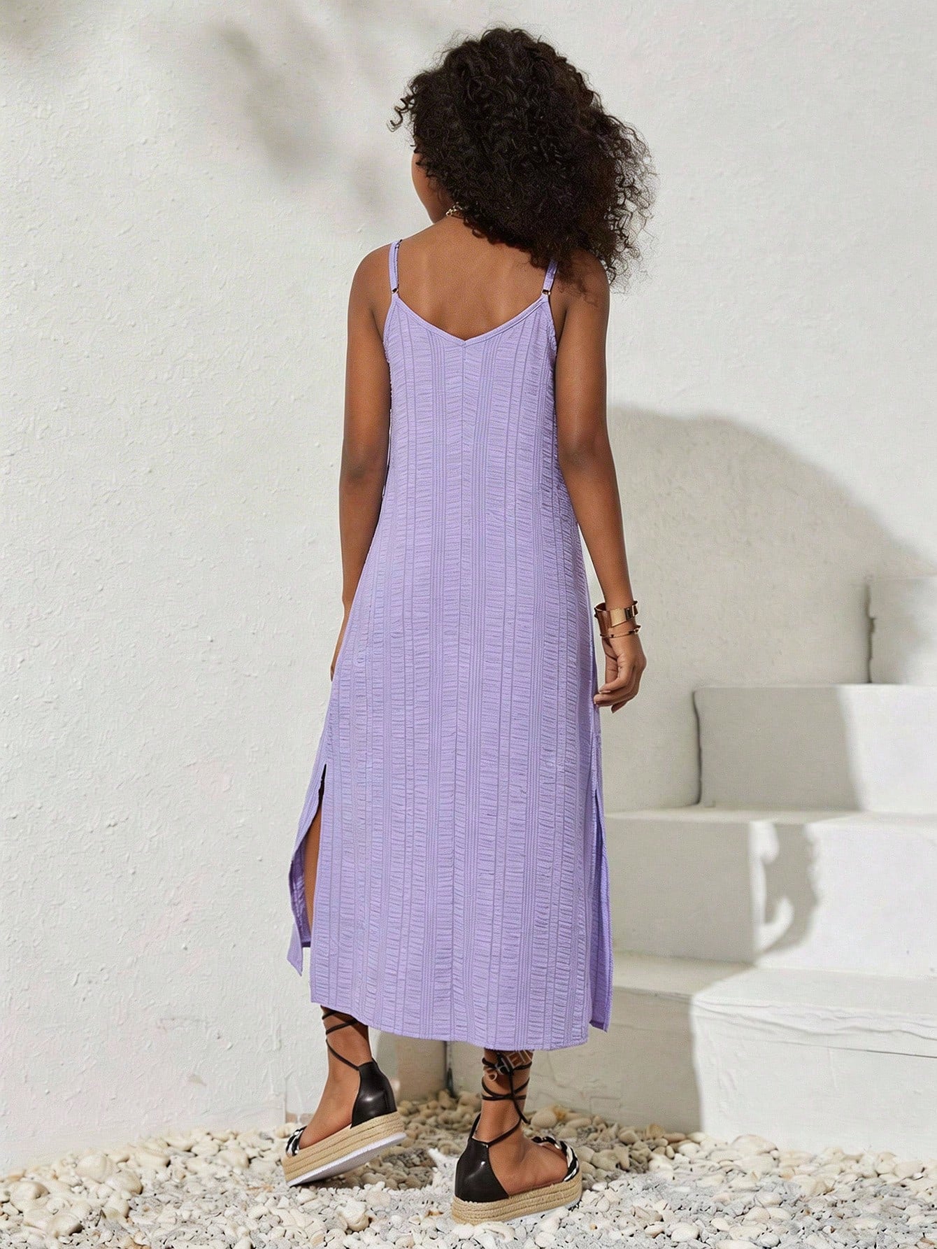 tween girls multicolor all-over printed spaghetti strap boho cami dress with sleeveless design, natural waist, flared hem, and long slim fit silhouette.