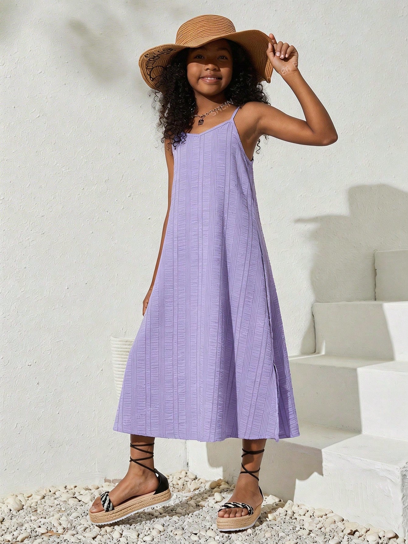 tween girls multicolor all-over printed spaghetti strap boho cami dress with sleeveless design, natural waist, flared hem, and long slim fit silhouette.