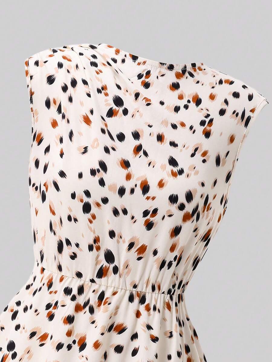 Tween girl wearing an apricot plant print sleeveless A-line long dress with a round neckline and flared skirt.