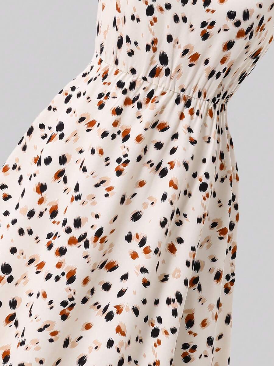 Tween girl wearing an apricot plant print sleeveless A-line long dress with a round neckline and flared skirt.
