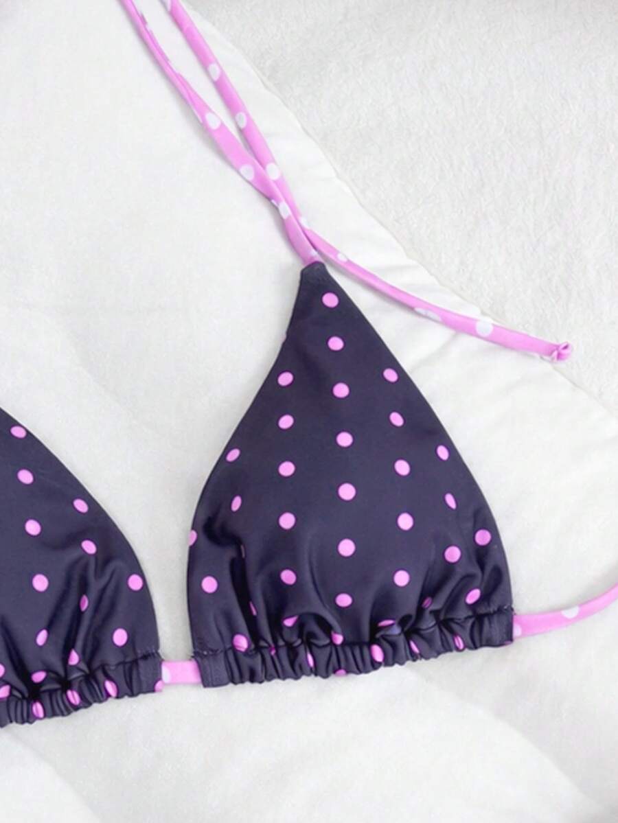 Women's high waist 2-piece triangle bikini set featuring colorblock trim, halter neckline, wireless bra with removable padding, and tie-side bottoms.
