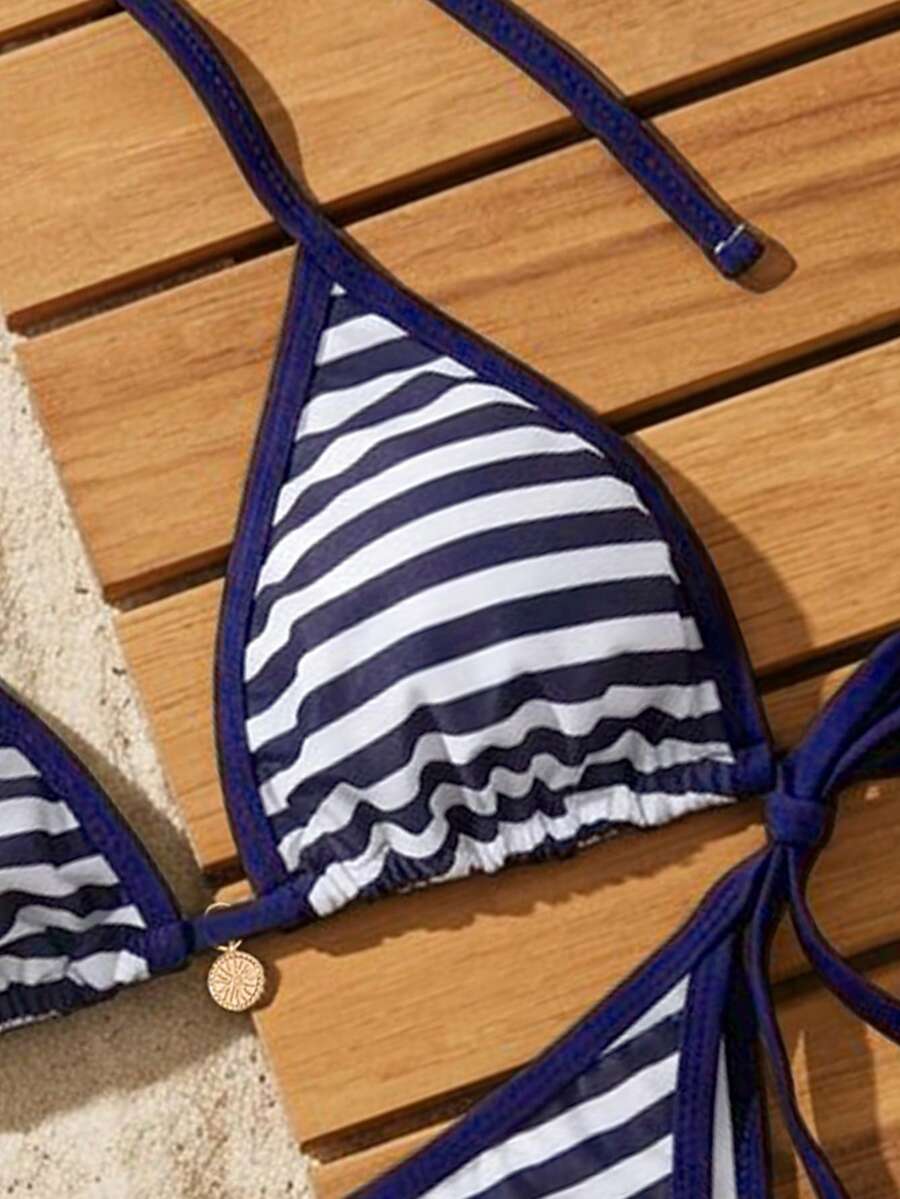 Women's high waist 2-piece triangle bikini set featuring colorblock trim, halter neckline, wireless bra with removable padding, and tie-side bottoms.
