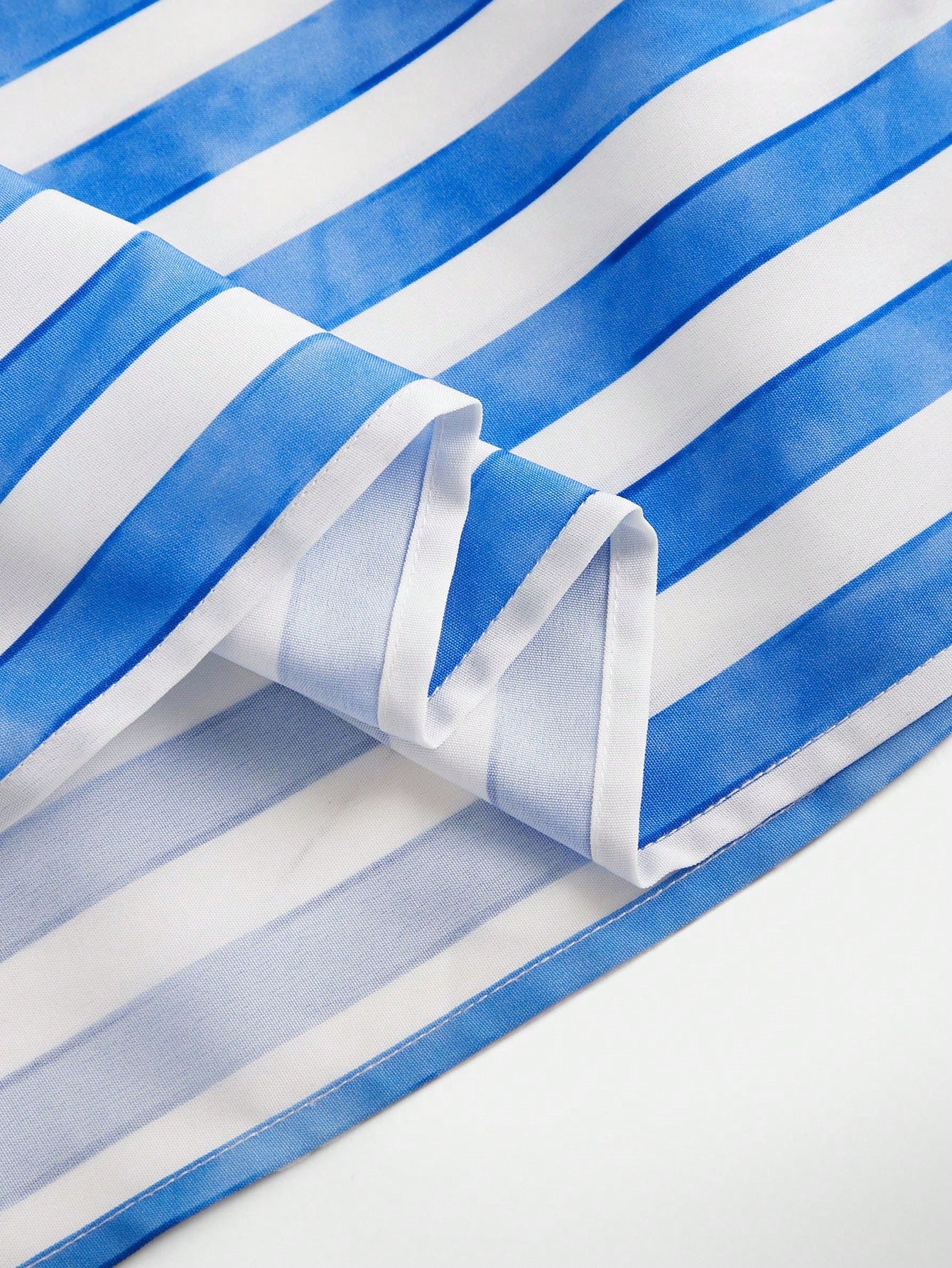 Tween girls striped spaghetti strap cami dress with high waist, shirred detail, zipper closure, sleeveless design, and flared long A-line silhouette for vacation wear.