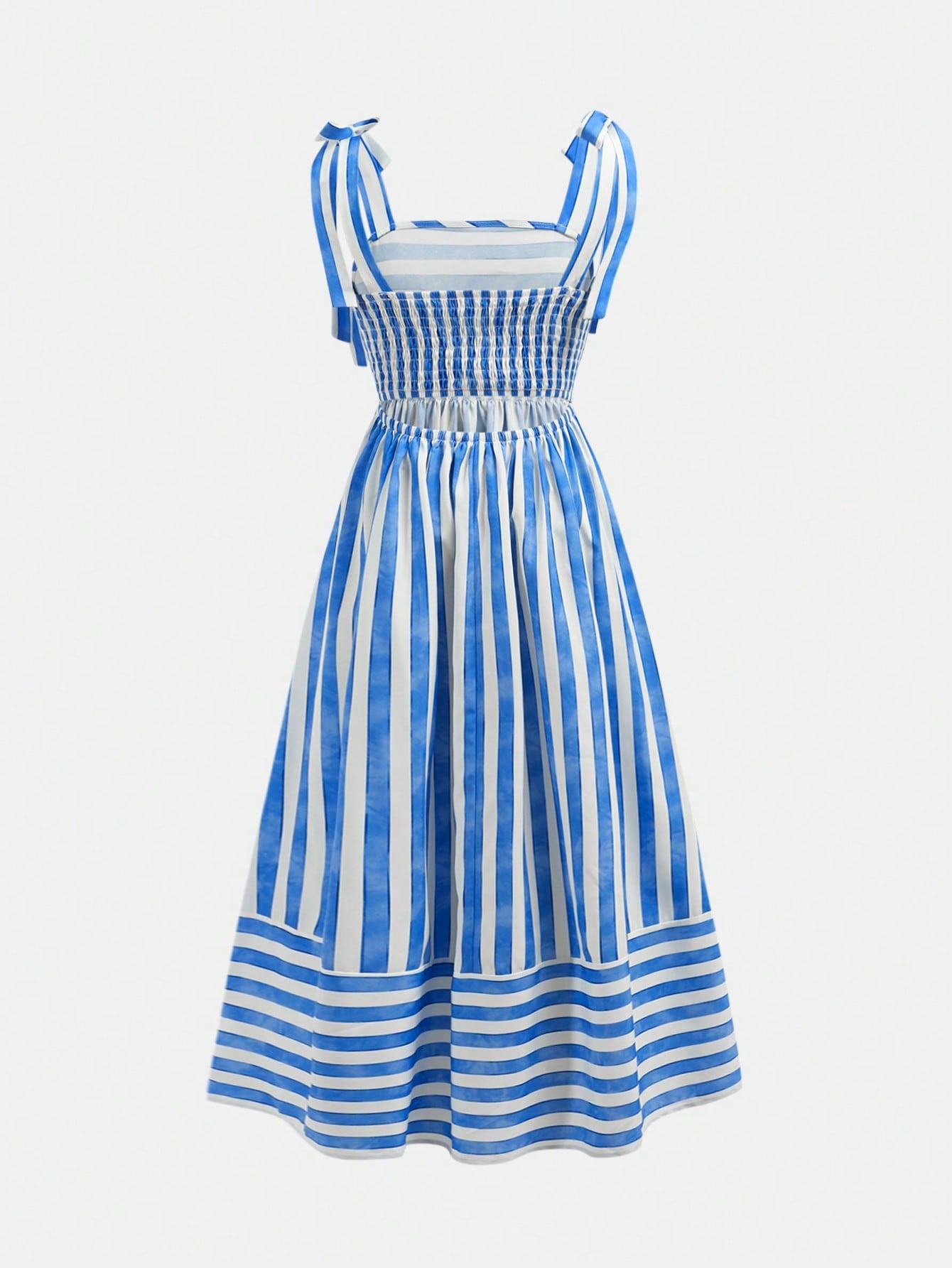 Tween girls striped spaghetti strap cami dress with high waist, shirred detail, zipper closure, sleeveless design, and flared long A-line silhouette for vacation wear.