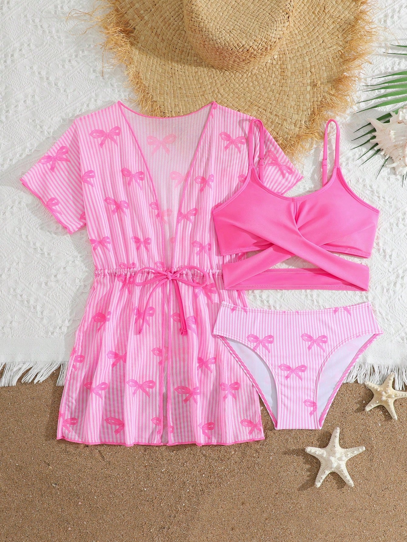 Three-piece tween girls swimwear set with a floral print, featuring a criss-cross bikini top, regular bikini bottoms, and a kimono cover-up in assorted prints.