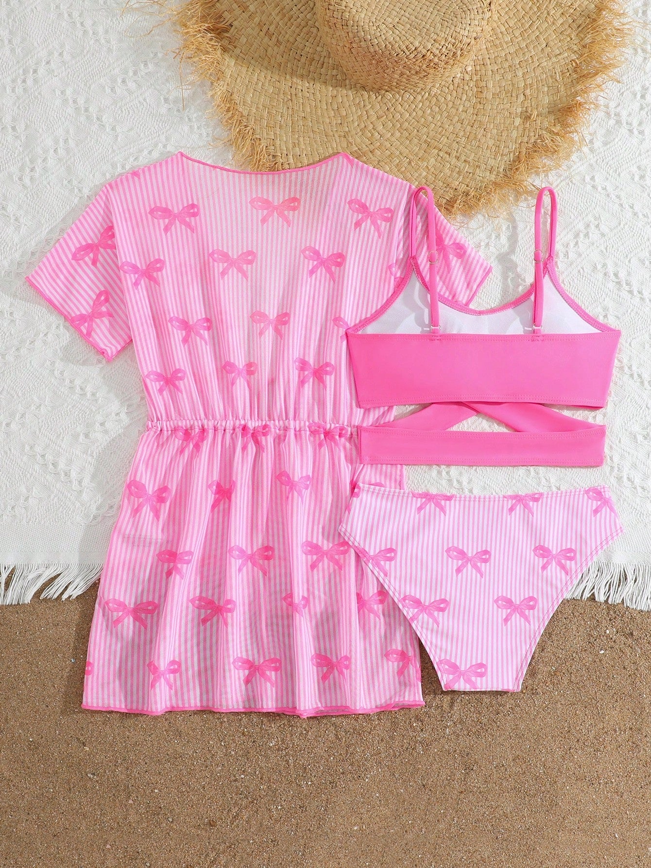 Three-piece tween girls swimwear set with a floral print, featuring a criss-cross bikini top, regular bikini bottoms, and a kimono cover-up in assorted prints.
