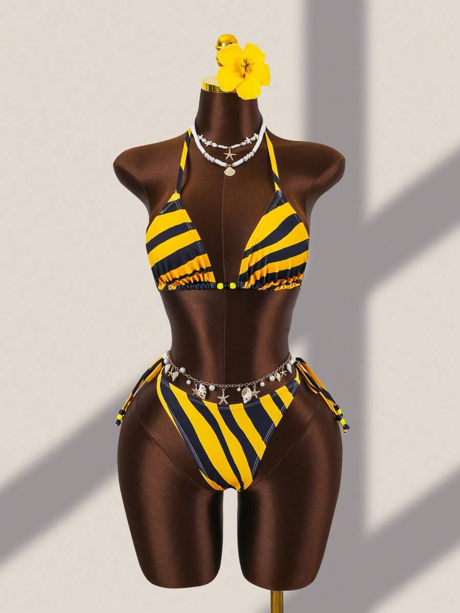 Brown striped 3-piece bikini set for women featuring a halter tie neck, wireless triangle cups with removable padding, cut-out details, and low waist tie side bottoms.