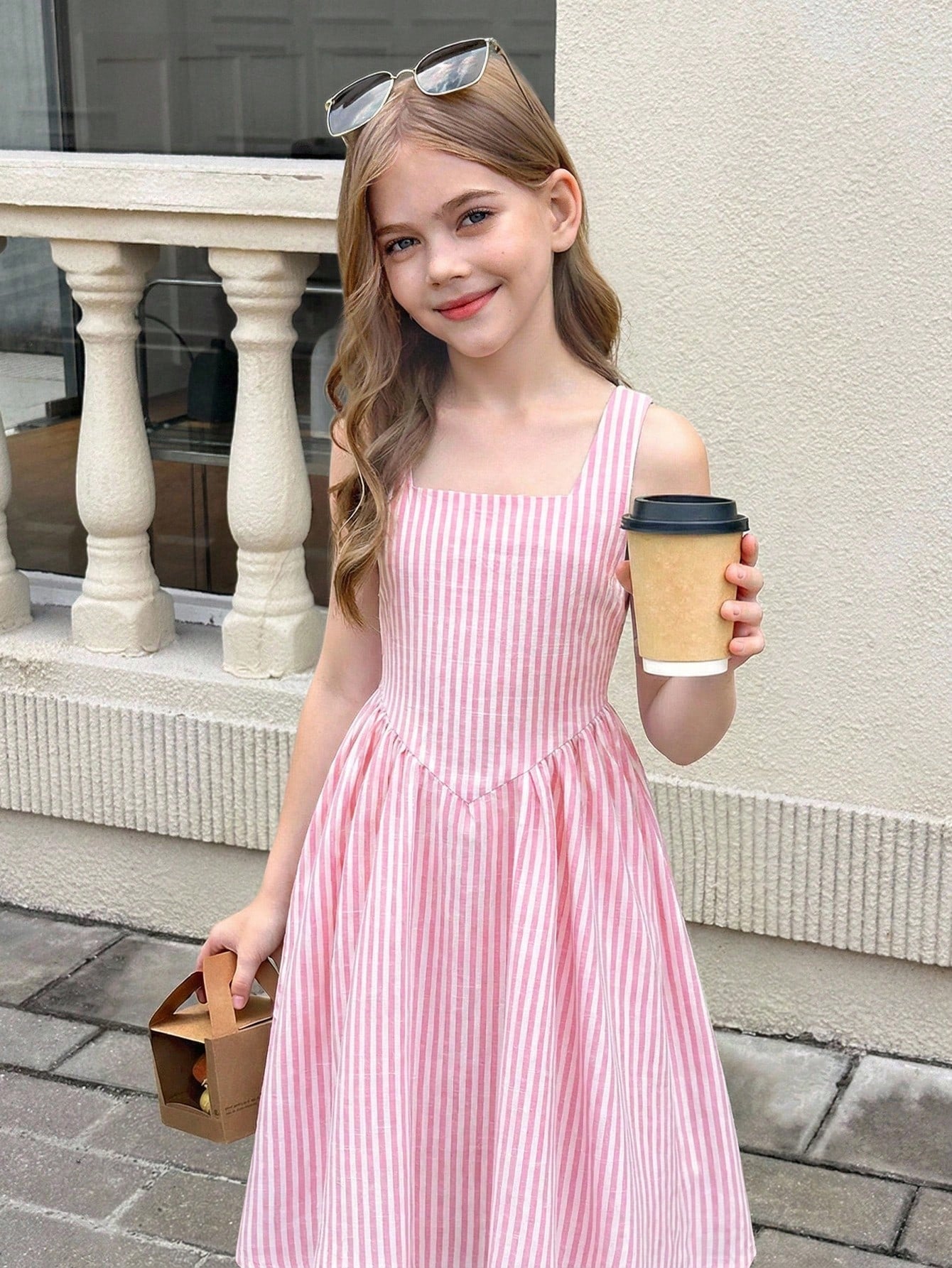 Tween girls pink floral sleeveless A-line midi dress featuring round neck, high waist with belt, contrast lace, and zipper back.