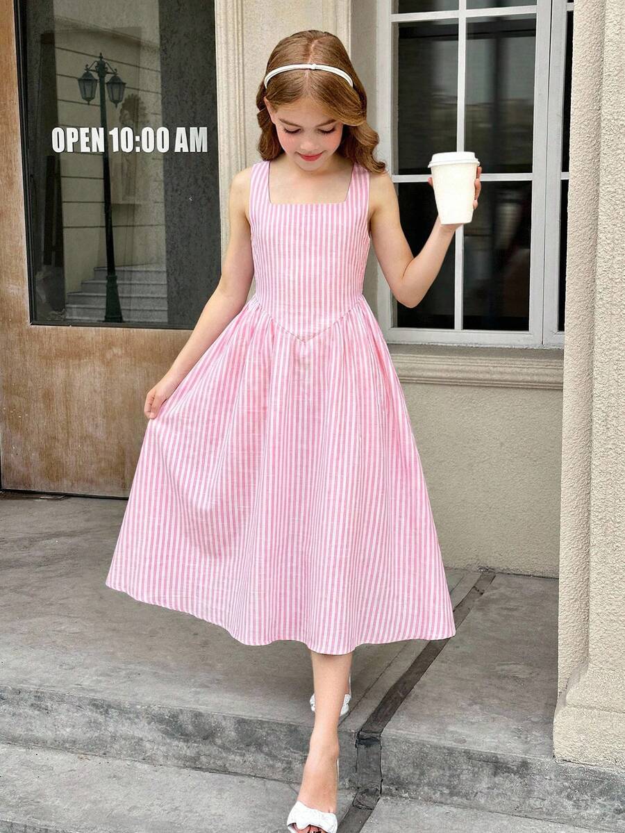 Tween girls pink floral sleeveless A-line midi dress featuring round neck, high waist with belt, contrast lace, and zipper back.