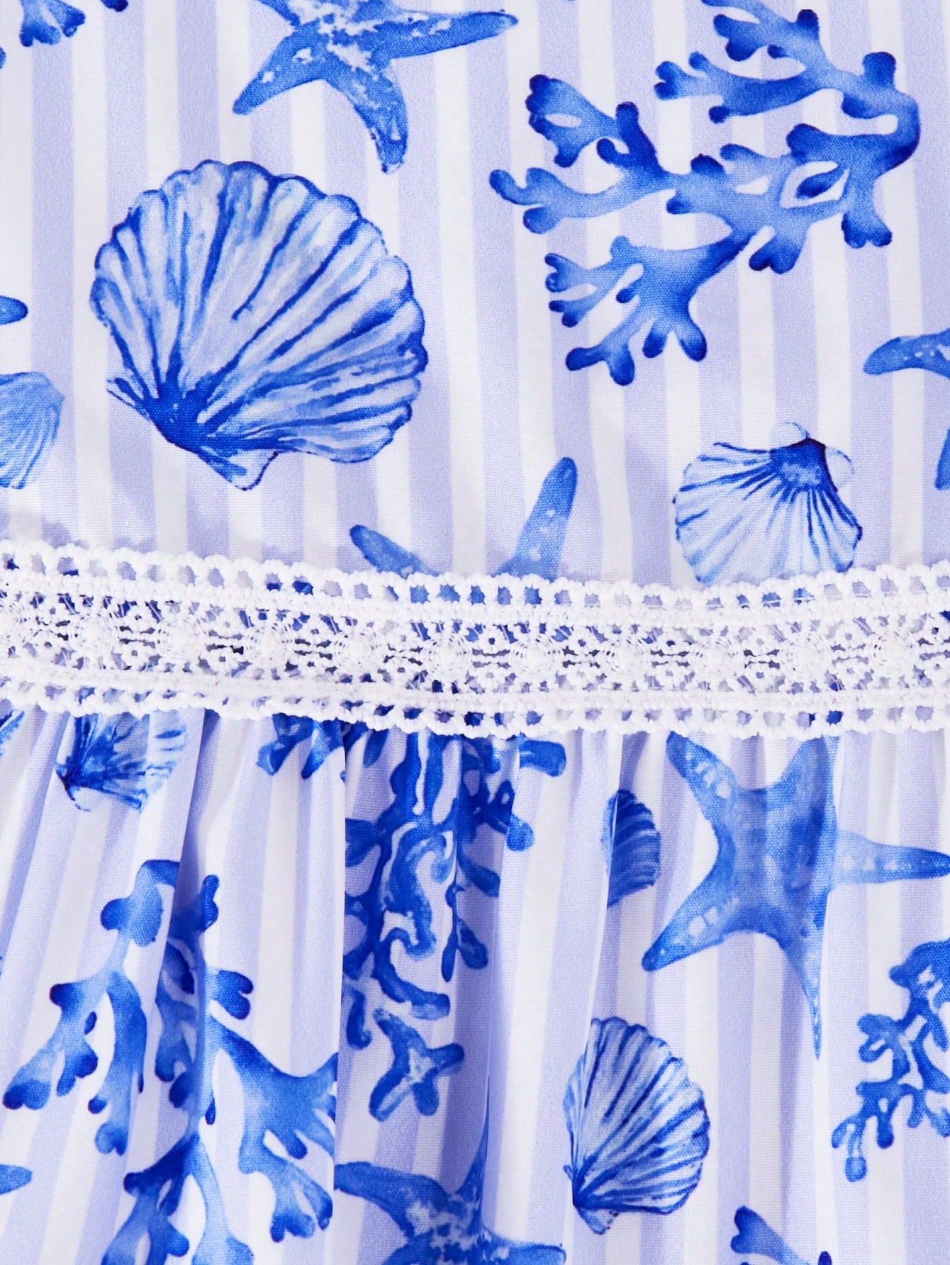 Girls spaghetti strap A-line midi dress with floral and marine-inspired vacation print, lace trim, high waist, and flared hem