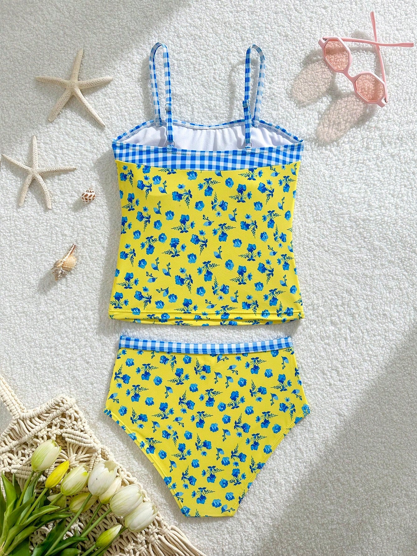Tween girls 2-piece bikini swimwear set in black with a wave-pattern geometric design, featuring halter neckline, wireless top, and high-waist short bottoms with starfish and shell decor.
