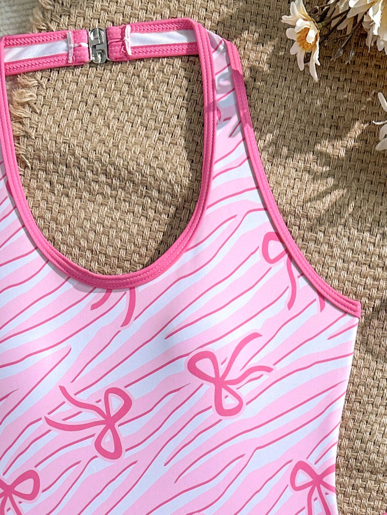 Girls 2-piece swimwear set featuring a butterfly print halter swimsuit top with contrast piping and separate mid-waist shorts; sleeveless, high-stretch, wireless design for beach and vacation wear.